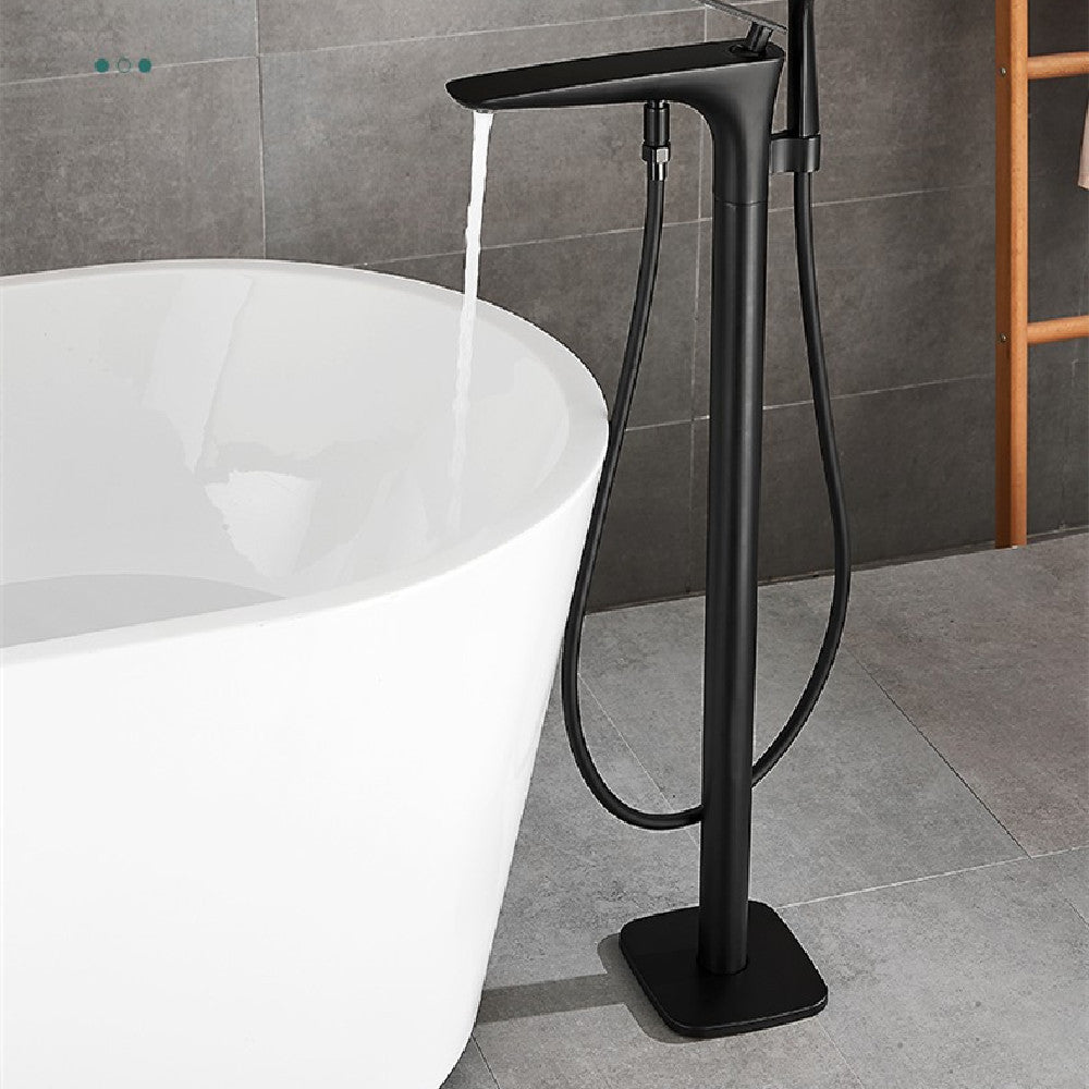 Create a stunning focal point in your bathroom with our Floor Type Black Bathtub Faucet. Featuring a sleek matte black finish, a high-flow waterfall spout, and a convenient handheld sprayer, this freestanding tub filler combines modern luxury with premium durability. Shop nordadecor.eu.