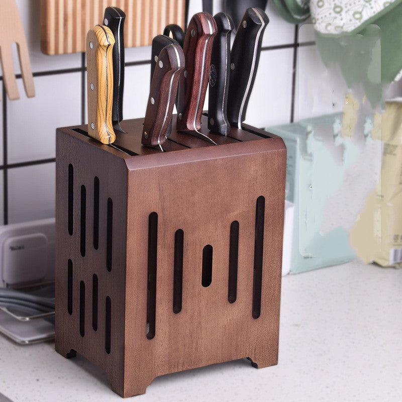 Acacia wood knife holder with slots for various kitchen blade sizes.