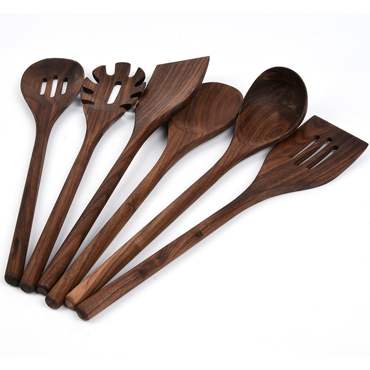 The six utensils are arranged in a clean, semi-circular fan shape. The wooden shovel (spatula) and the largest spoon should be at the center, with the smaller tools flanking them.