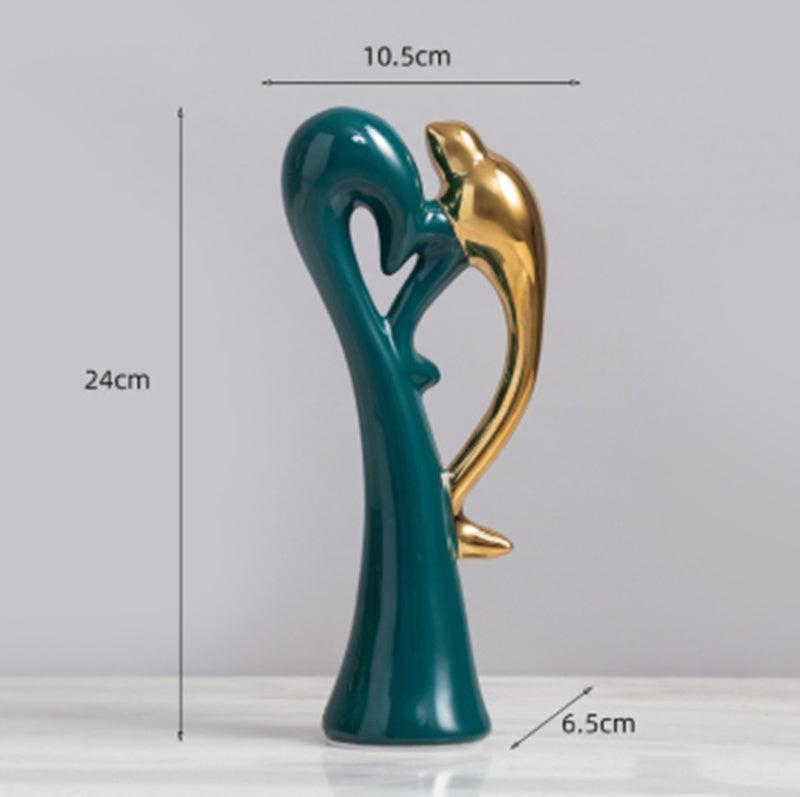 White glazed ceramic bird figurine with a smooth polished finish.