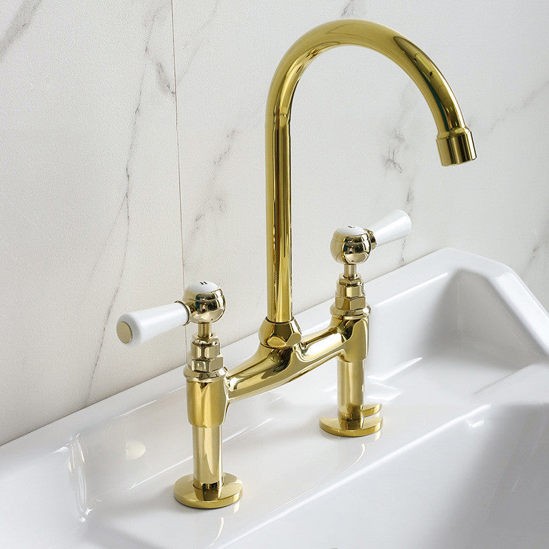 Upgrade your kitchen with our New Ceramic Handle Faucet. Combining a premium metallic finish with a classic white ceramic lever, this high-arc sink tap brings timeless elegance and modern durability to your home. Shop the collection at nordadecor.eu.